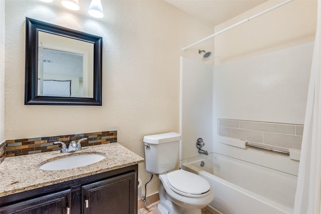 full bathroom featuring backsplash, shower / bathtub combination, vanity, a textured ceiling, and toilet