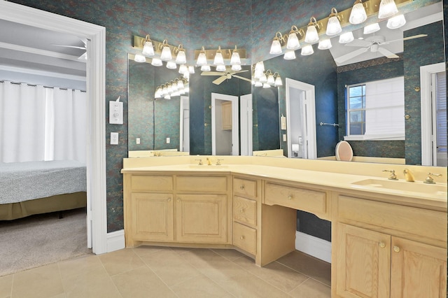 bathroom with tile patterned flooring, vanity, and ceiling fan