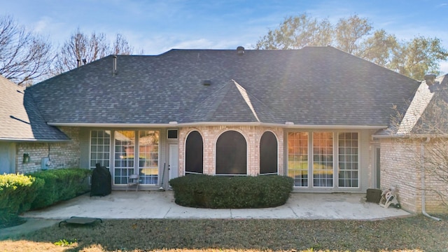 rear view of house with a patio