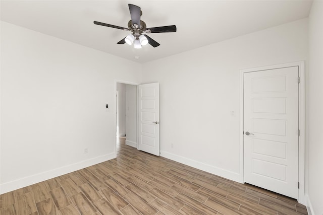 unfurnished room featuring ceiling fan