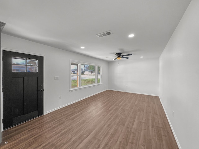 entrance foyer featuring hardwood / wood-style flooring and ceiling fan