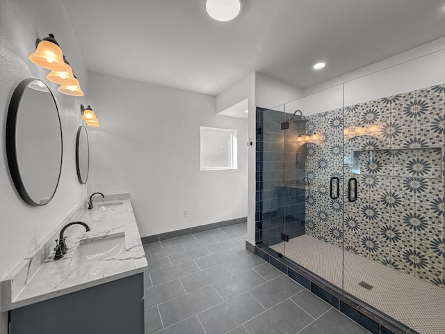 bathroom with walk in shower, tile patterned floors, and vanity