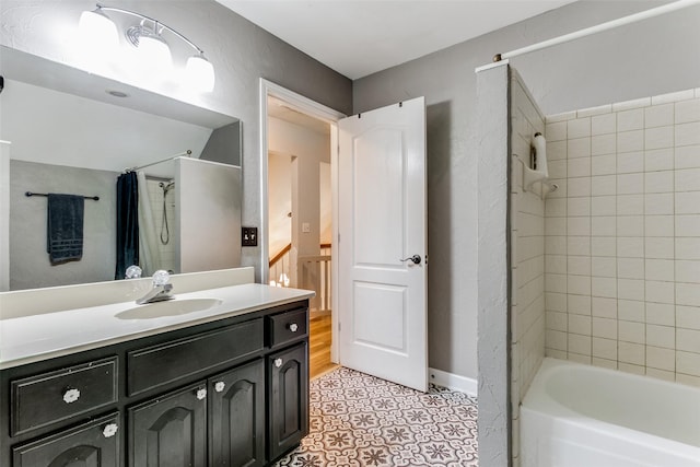 bathroom featuring vanity and shower / bath combo with shower curtain