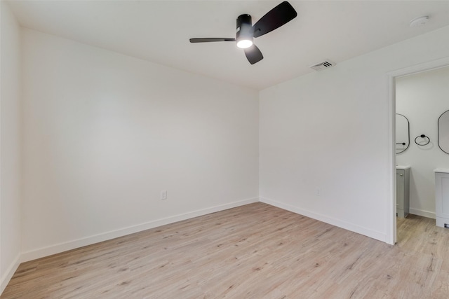 empty room featuring light hardwood / wood-style floors and ceiling fan