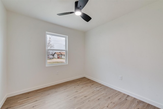 unfurnished room featuring light hardwood / wood-style floors and ceiling fan