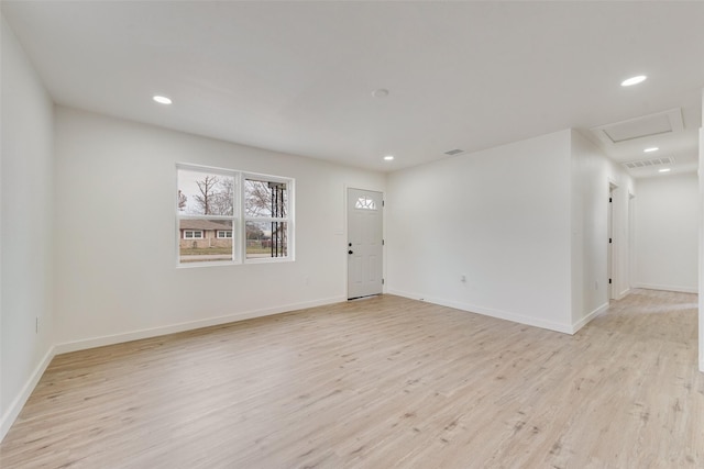 unfurnished room featuring light hardwood / wood-style floors