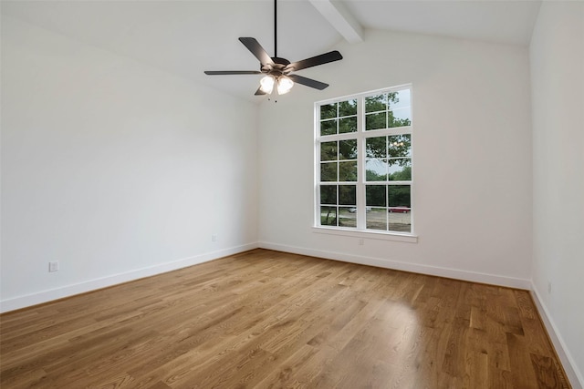 unfurnished room featuring vaulted ceiling with beams, light hardwood / wood-style floors, and ceiling fan