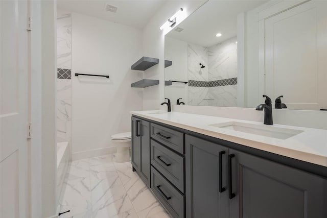 bathroom with vanity, toilet, and walk in shower