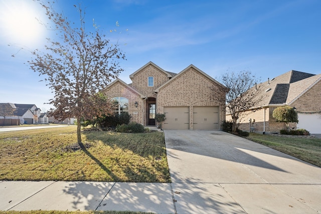 front facade with a garage and a front lawn