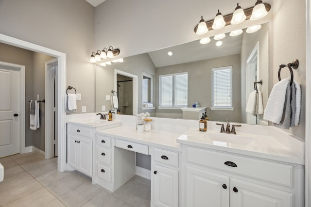 bathroom with tile patterned floors and vanity