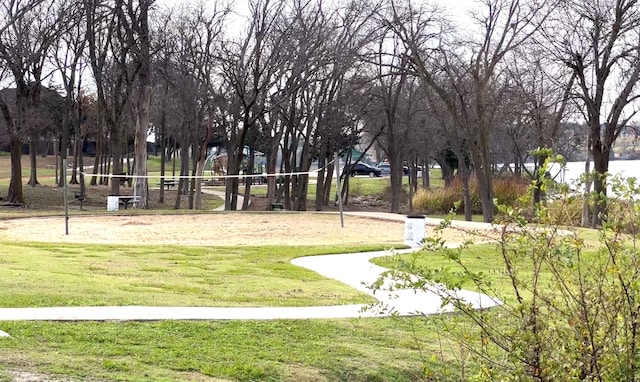 view of community featuring a yard and volleyball court