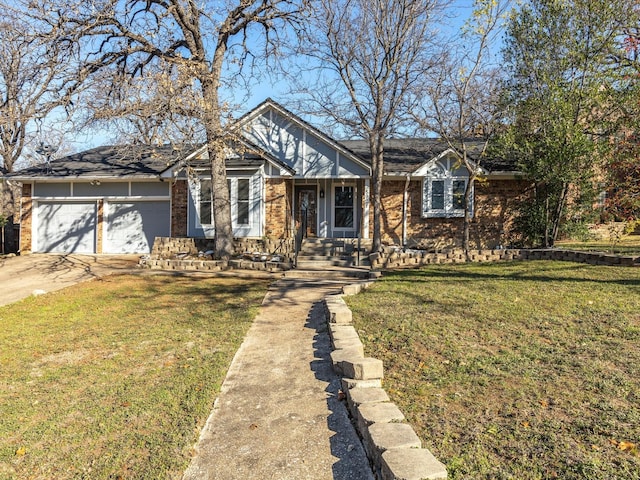 view of front of house with a garage and a front lawn