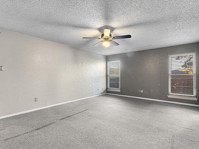 bathroom featuring a textured ceiling, vanity, ceiling fan, and  shower combination