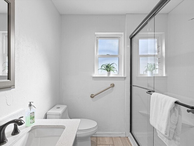 washroom with cabinets, washer hookup, a textured ceiling, and hookup for an electric dryer