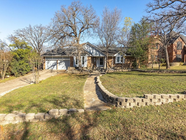 ranch-style home featuring a garage and a front lawn