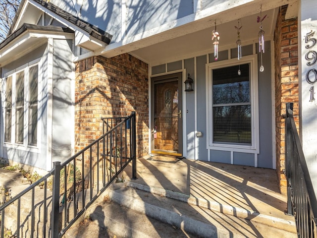 property entrance featuring covered porch