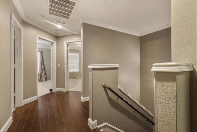 2204 Stonepark Pl, Mckinney, TX 75071 - corridor featuring visible vents, ornamental molding, wood finished floors, baseboards, and an upstairs landing