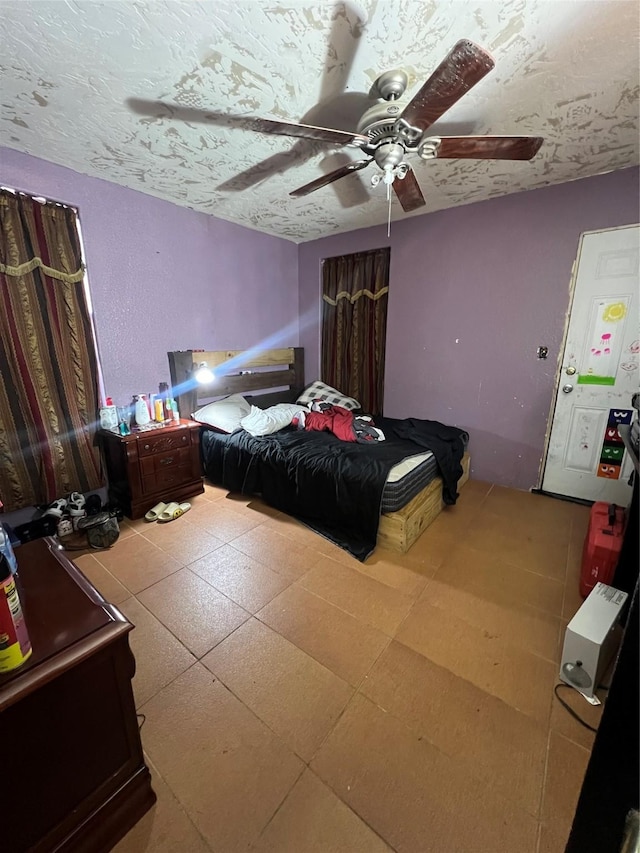 bedroom featuring ceiling fan