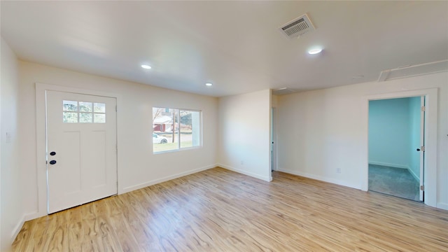 entrance foyer with light hardwood / wood-style flooring