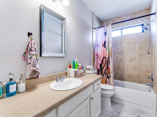 full bathroom with shower / bath combo, vanity, and toilet