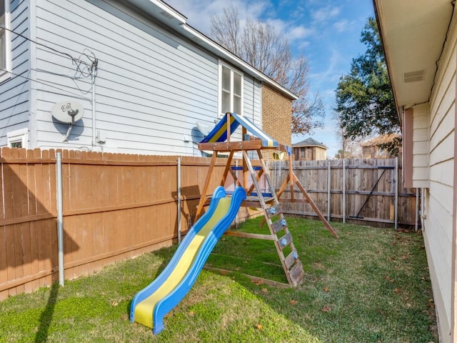 view of play area with a lawn