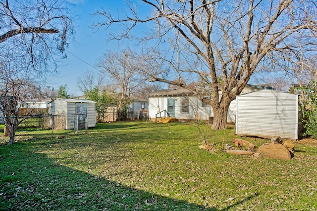 view of yard with a storage unit