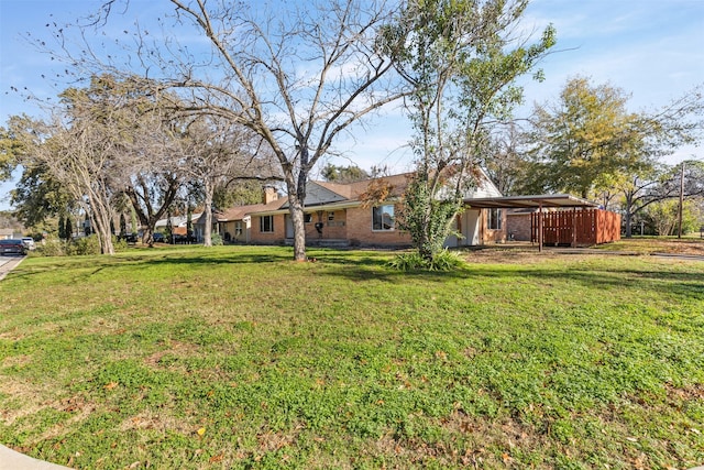 view of yard with a carport