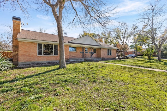 single story home with a front yard