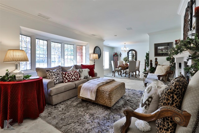 living room featuring crown molding, light tile patterned flooring, and a chandelier