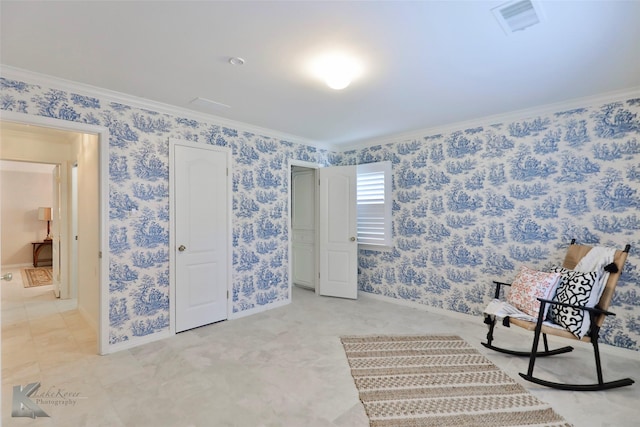 living area with crown molding