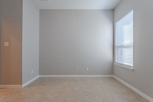 view of tiled spare room