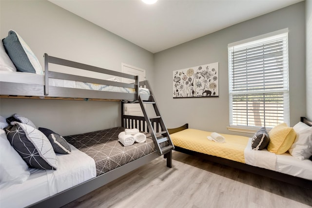 bedroom featuring hardwood / wood-style floors