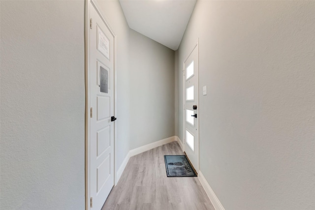 entryway with light hardwood / wood-style flooring