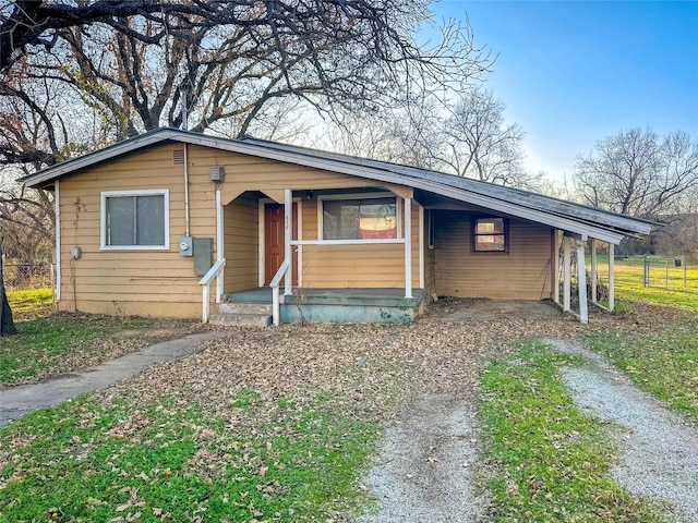 view of front facade featuring a carport