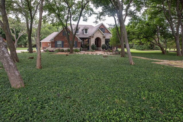 view of front of house with a front yard