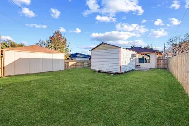 view of yard featuring a storage unit