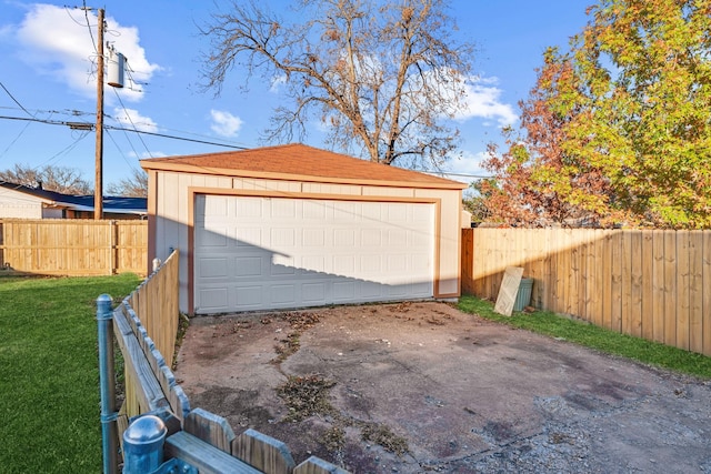 garage with a yard