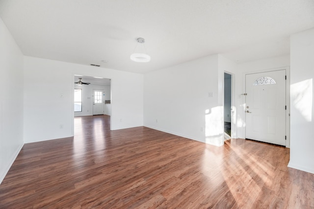 interior space with hardwood / wood-style floors