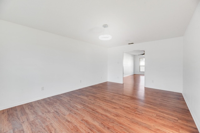 unfurnished room featuring light hardwood / wood-style flooring