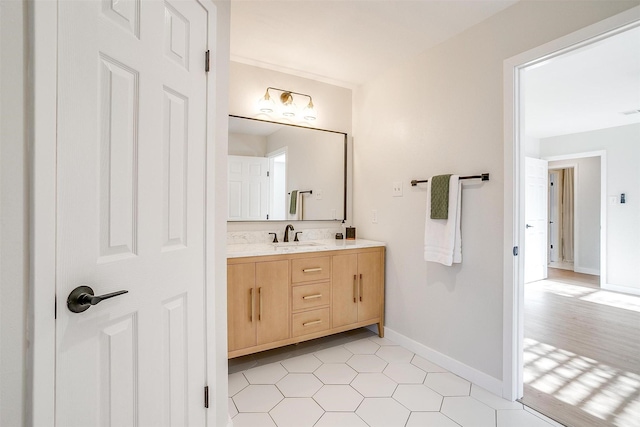 bathroom with tile patterned flooring and vanity