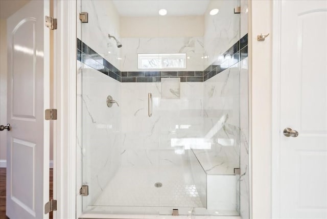 bathroom with an enclosed shower