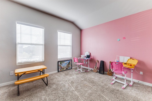 recreation room with carpet floors and lofted ceiling