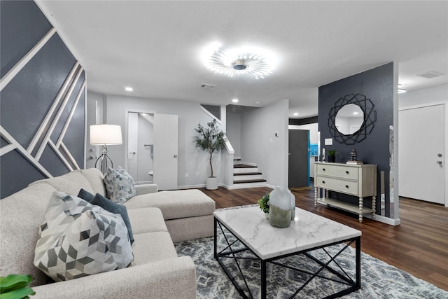 living room with dark hardwood / wood-style floors