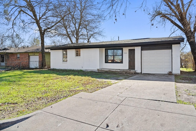 single story home with a front yard and a garage