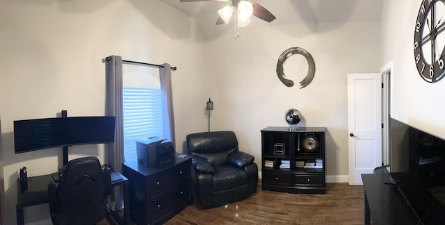 office space with dark hardwood / wood-style floors, ceiling fan, and lofted ceiling