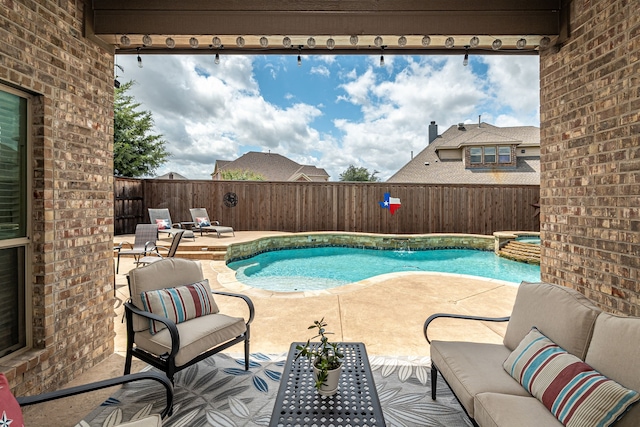 view of swimming pool featuring a patio and an outdoor hangout area