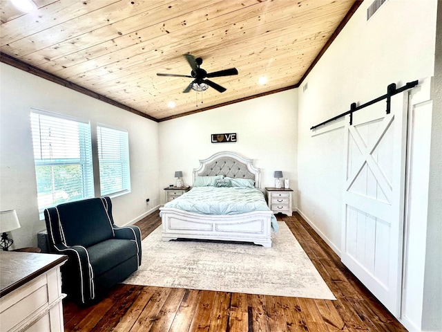 bedroom with ceiling fan, a barn door, dark hardwood / wood-style flooring, and wood ceiling