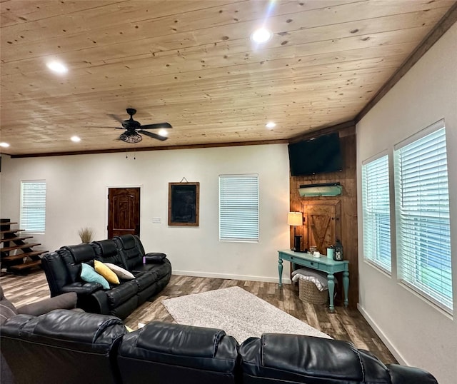 living room with hardwood / wood-style flooring, ceiling fan, wooden ceiling, and crown molding