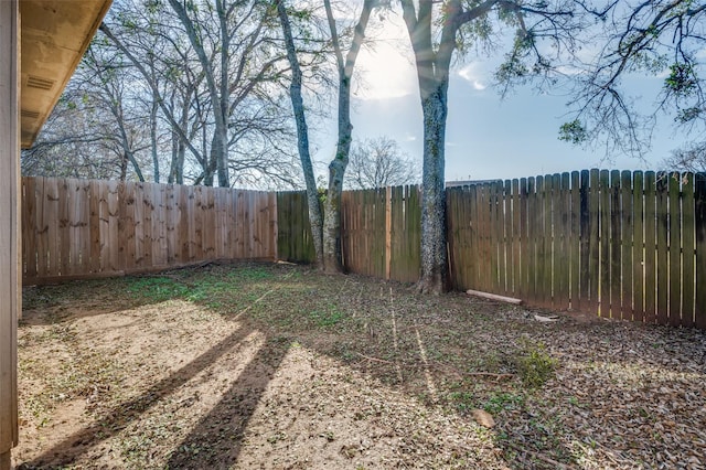 view of yard featuring a fenced backyard