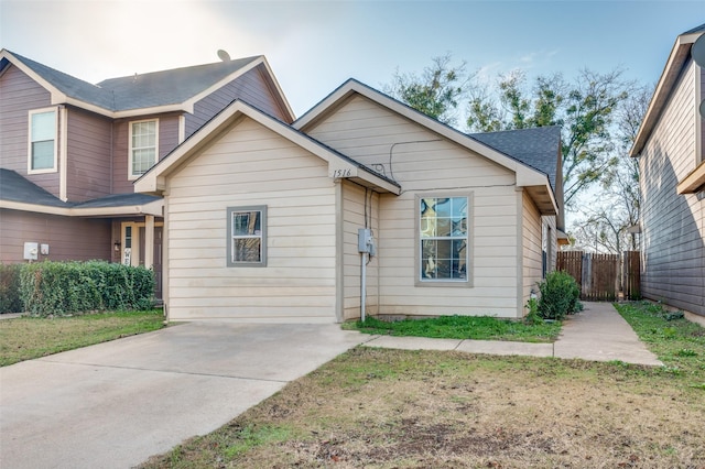 view of front of house with fence